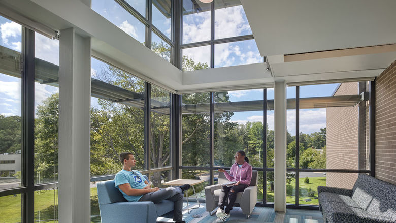 Penn State Abington Lions Gate near Philadelphiasouth lounge with students sitting on couches 