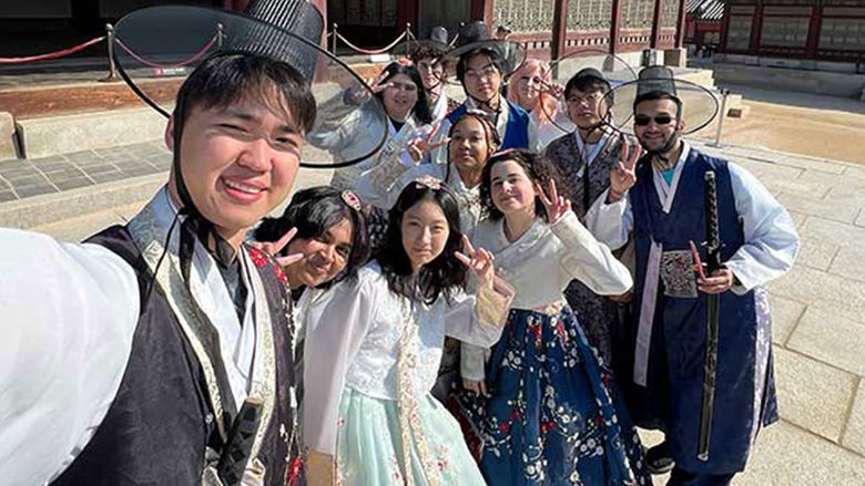 Penn State Abington students wearing hanbok traditional Korean clothing