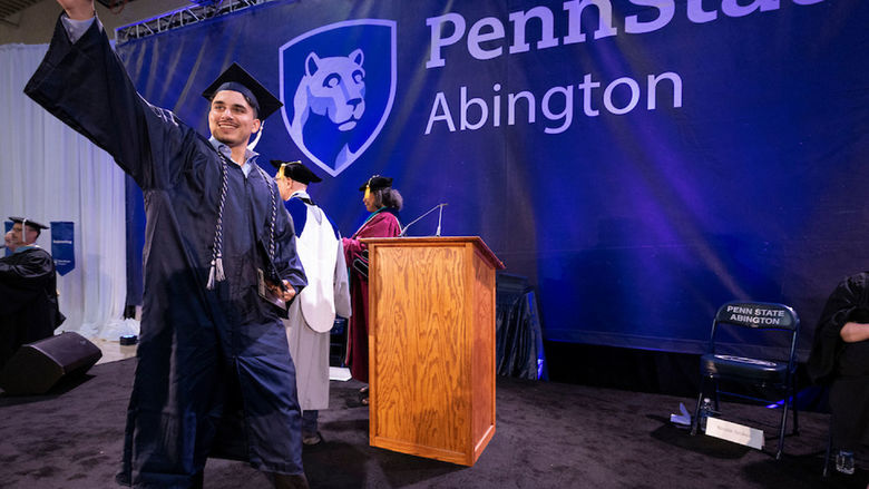 New graduates celebrating after receiving diploma