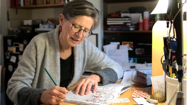 Susan Squier working on her comics journal
