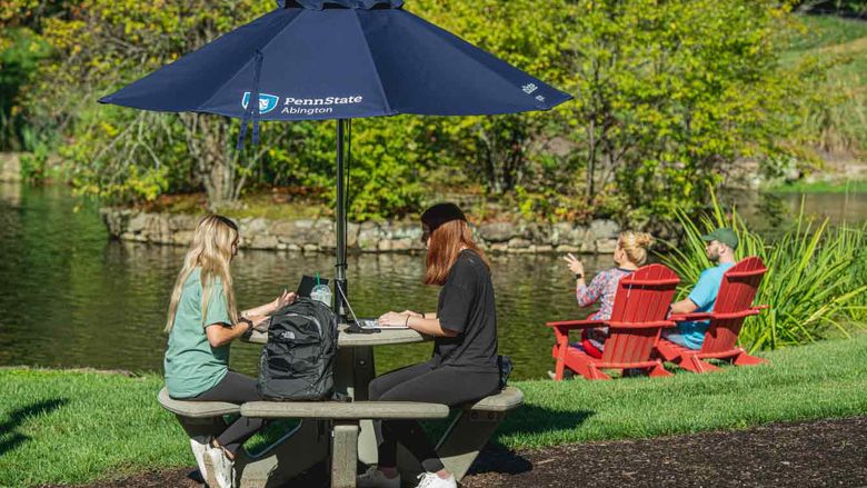 Students by pond