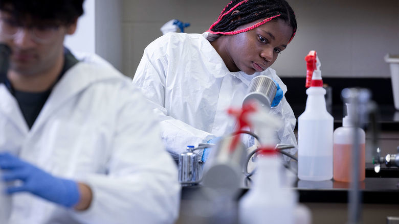 Student in a college laboratory
