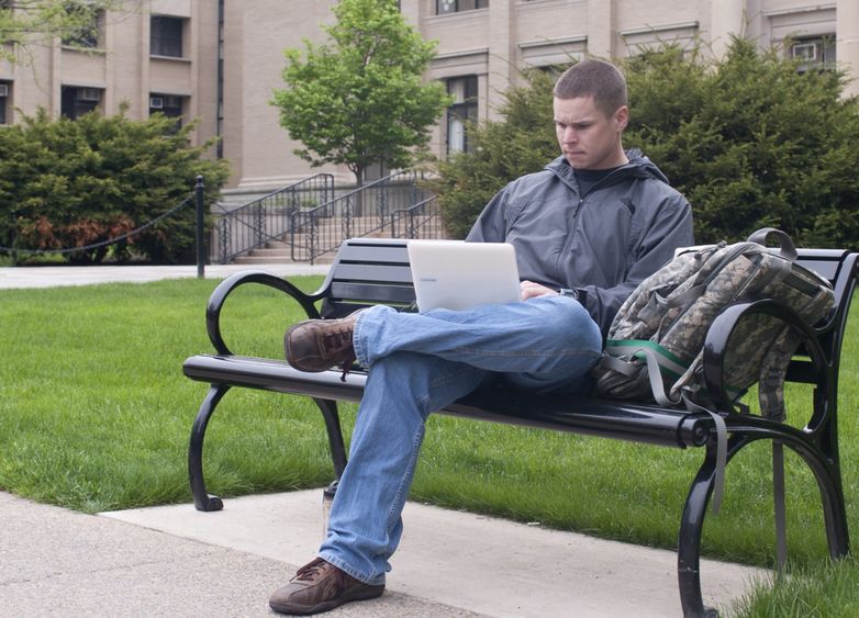 Student studying outside Burrows