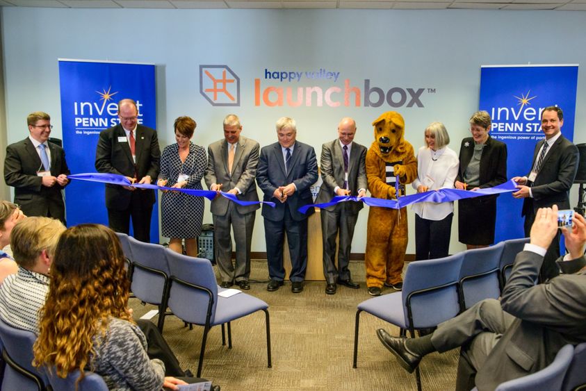 President Barron and guests do ceremonial ribbon cutting for Happy Valley LaunchBox