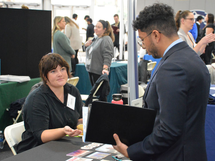 Recruiter and Penn State Abington student at the fall 2023 career fair