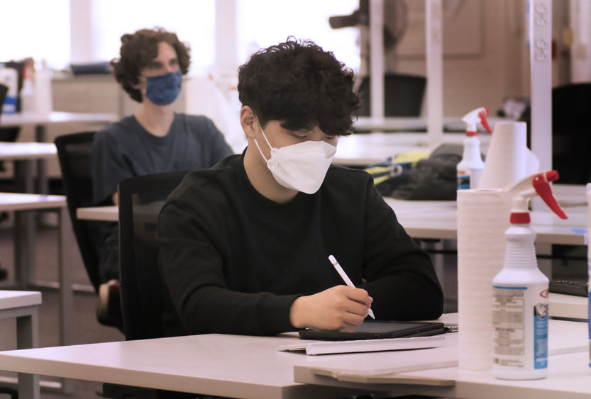 students in class with masks